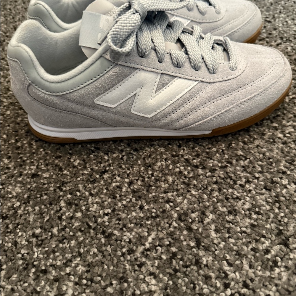 New Balance Light Gray Suede Athletic Sneakers with Gum Sole